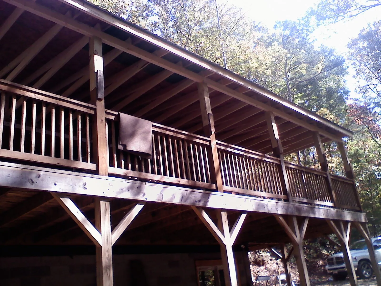 Timber framing under a new elevated porch and deck — Roof Leak Repair in Slatersville by Roofing Brothers